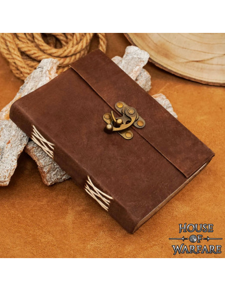 Diário medieval com capa de couro...