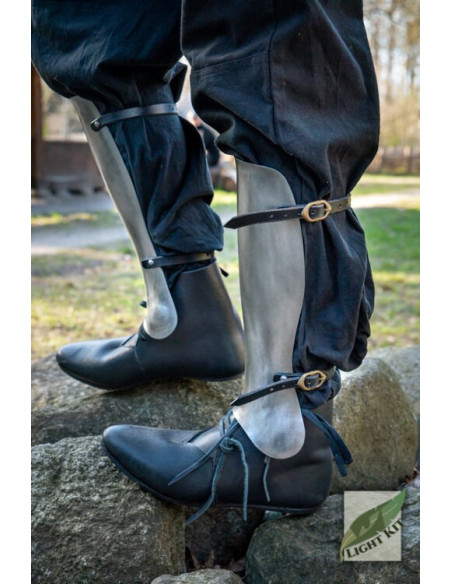 Grevas de mercenário de aço polido