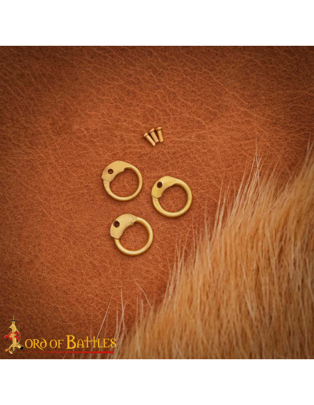 Anéis redondos de latão com rebites...