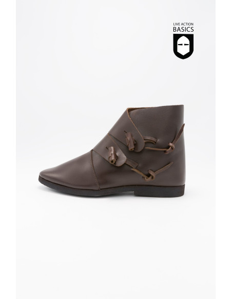 Sapatos medievais com fecho lateral...