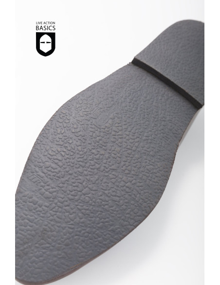 Sapatos medievais com fecho lateral...