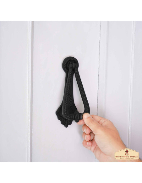 Aldava de porta medieval com anel em...