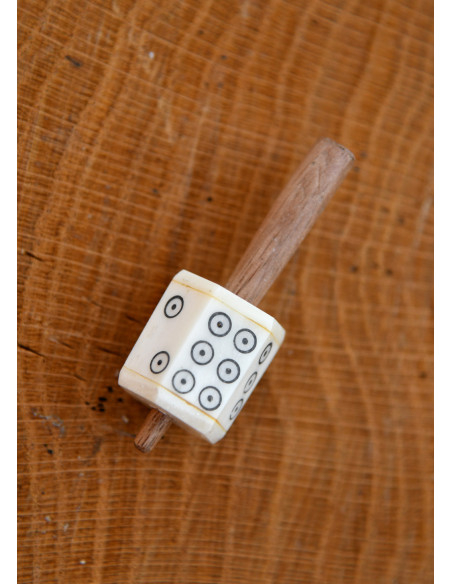 Dado giratório feito de osso