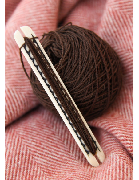 Lançadeira em osso com padrão trançado