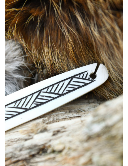 Lançadeira medieval de osso para tecer